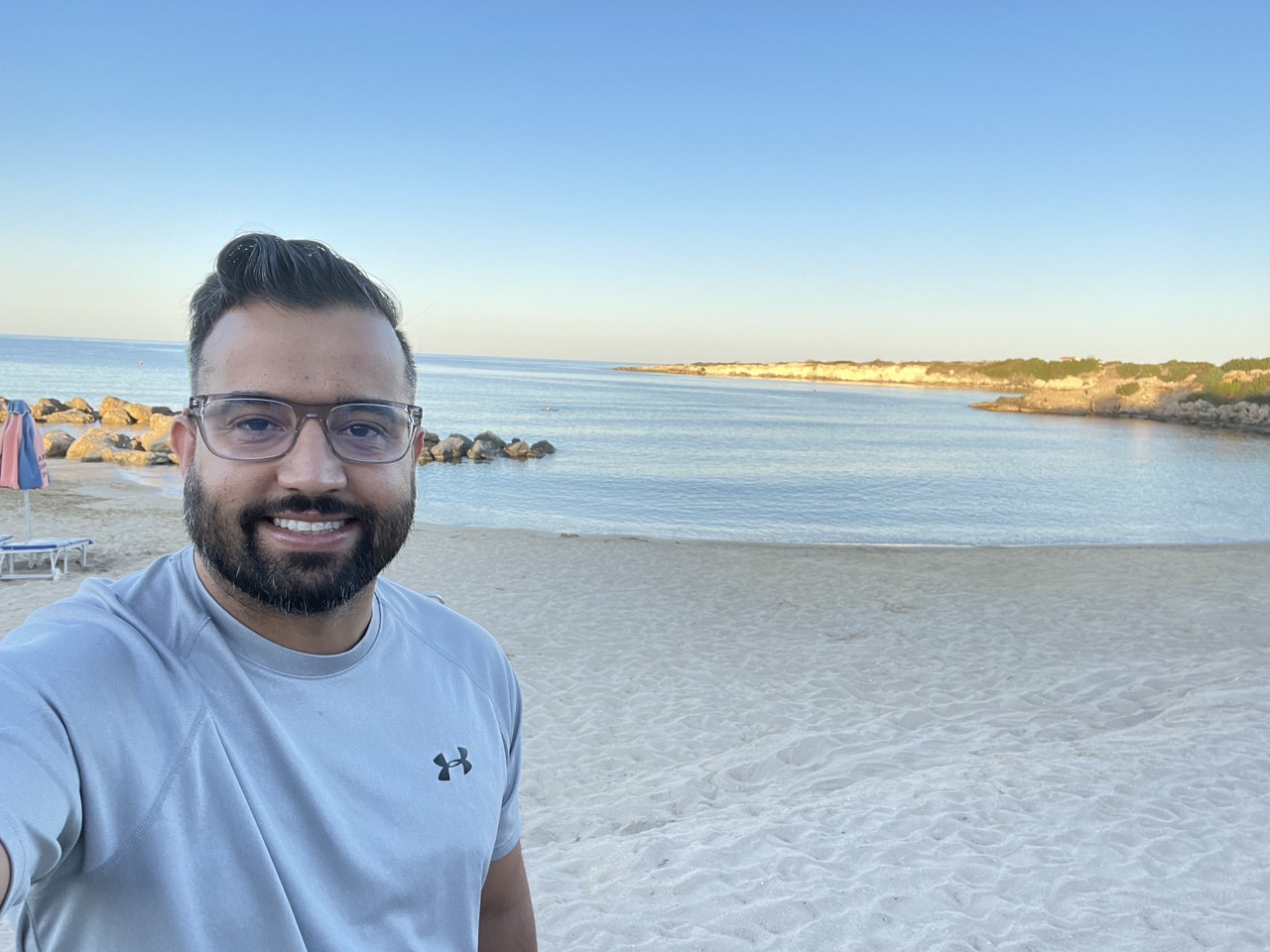 Imran Rahman on a Mediterranean beach