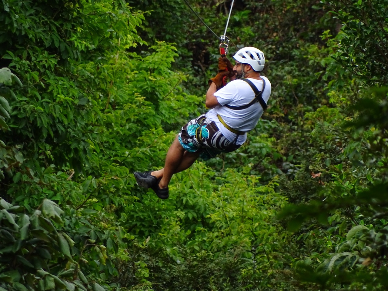 Imran Rahman ziplining through the jungle